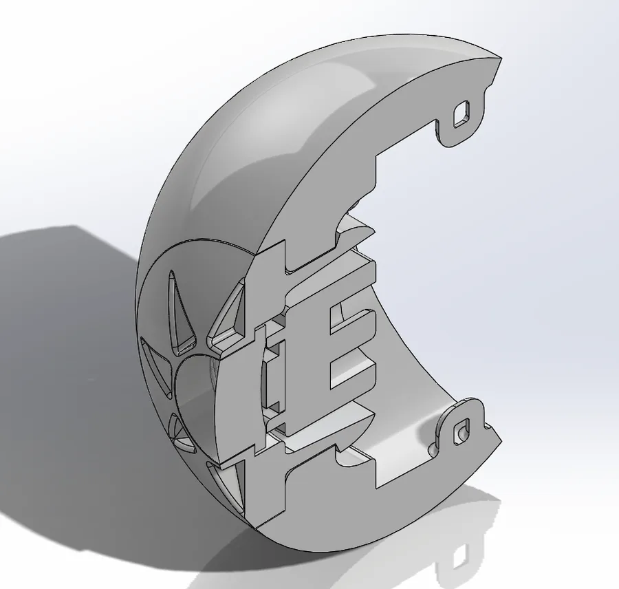 3D section view of the assembled eye showing how the snaps seat in their receptacles and the wire channels feeding the LED board